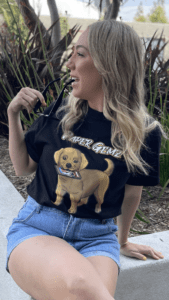 Woman wearing a shirt with a dog image